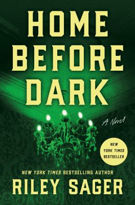 Book cover for “Home Before Dark” by Riley Sager, featuring a dark green haunted house silhouette surrounded by glowing lights against a shadowy background.