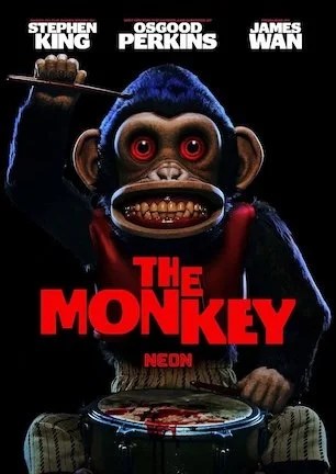 A horror movie poster showing a sinister toy monkey with glowing red eyes and sharp teeth, holding a drumstick above a blood-splattered drum. The background is black, and the title “The Monkey” appears in large red letters beneath the figure.