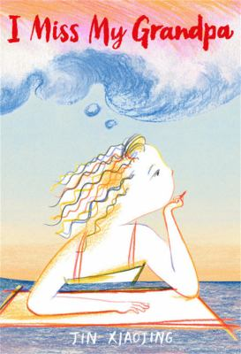 Cover of I Miss My Grandpa by Jin Xiaojing. Features a drawing of a girl sitting at a table with a blank sheet of paper in front of her.