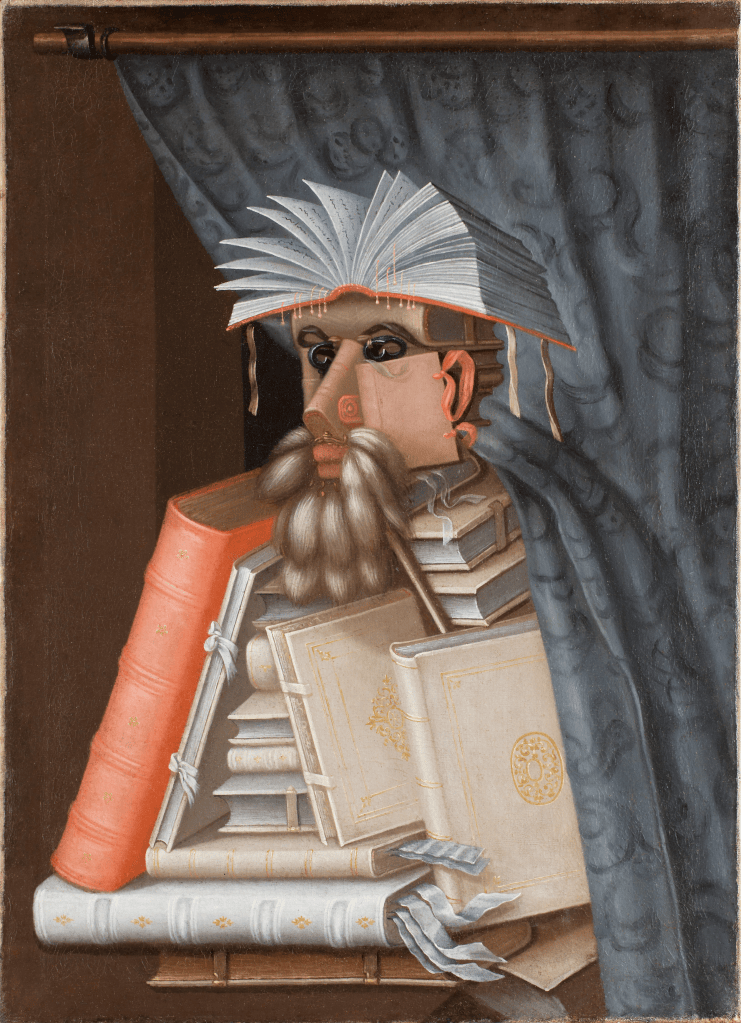 A portrait made entirely of books to resemble a man in profile. An open book with fanned pages forms the head and and hair, book spines create the beard, and stacked books form the body and arms. A curtain is drawn back on either side, and a rolled scroll or manuscript hangs at the bottom like a hand.